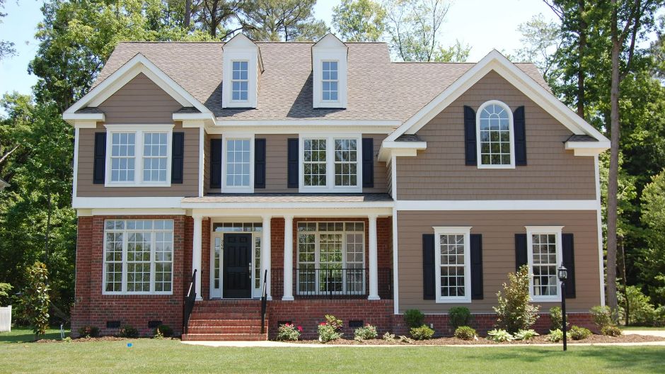 Composite Siding 940px Beautiful home pictured after residential siding installation in Mequon, WI