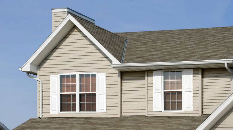 Vinyl Siding 940px Home with beige maintenance-free vinyl siding in Mequon, WI